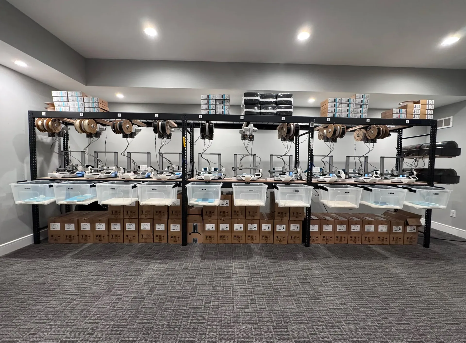 Photon Print Farm's fleet of Bambu Lab printers running production jobs.